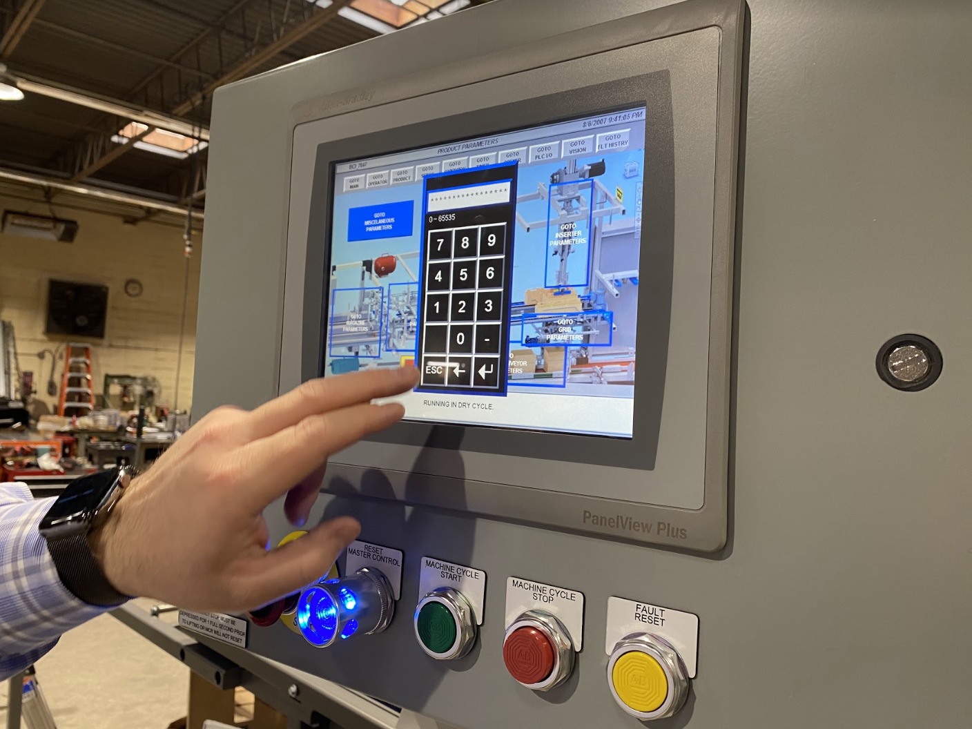 A Wayne technician tests an Allen Bradley MicroLogix™ Micro Processor with PanelView™ Color Touch Screen HMI