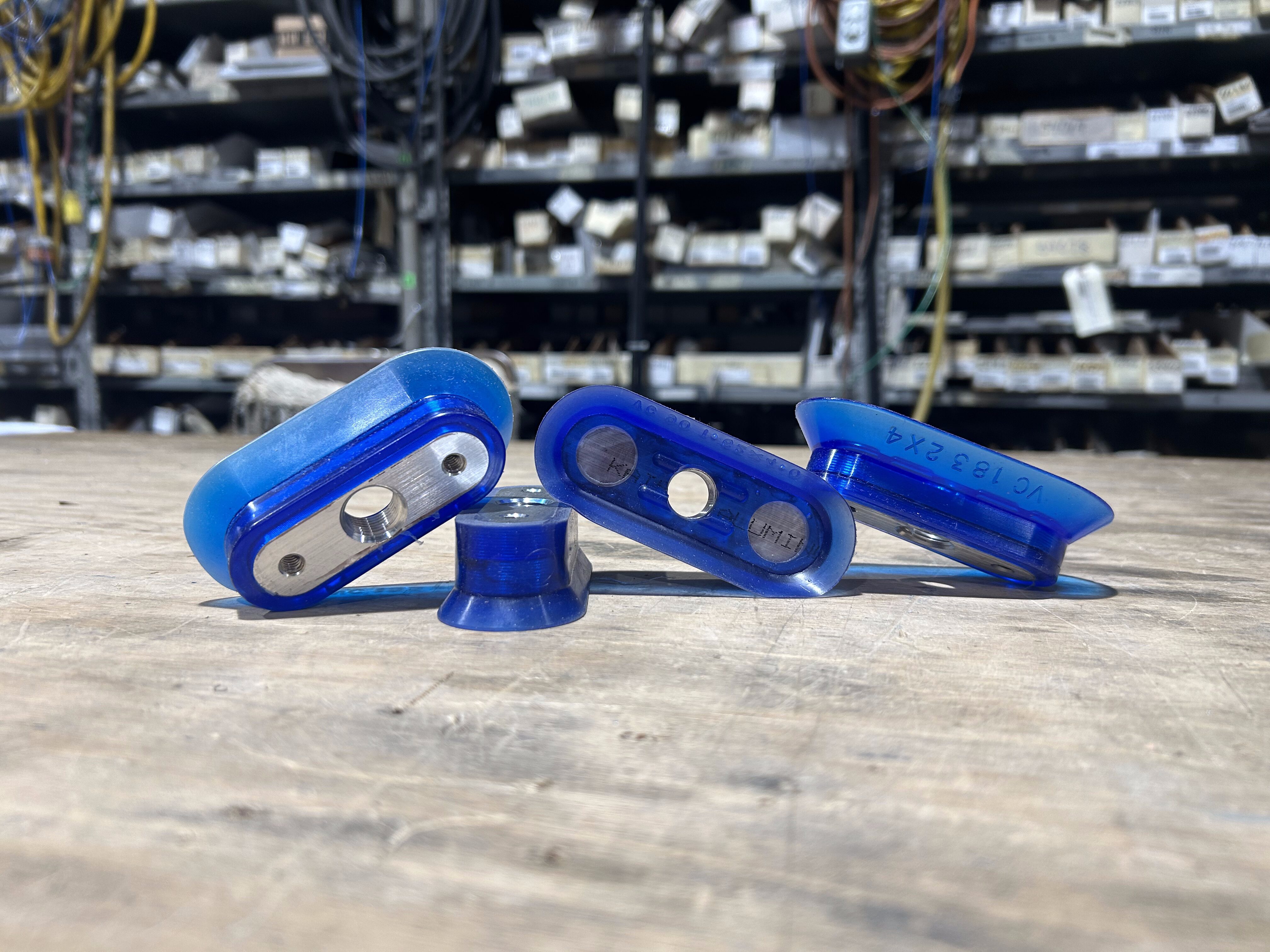 blue suction cups from a Wayne Automation packaging machine